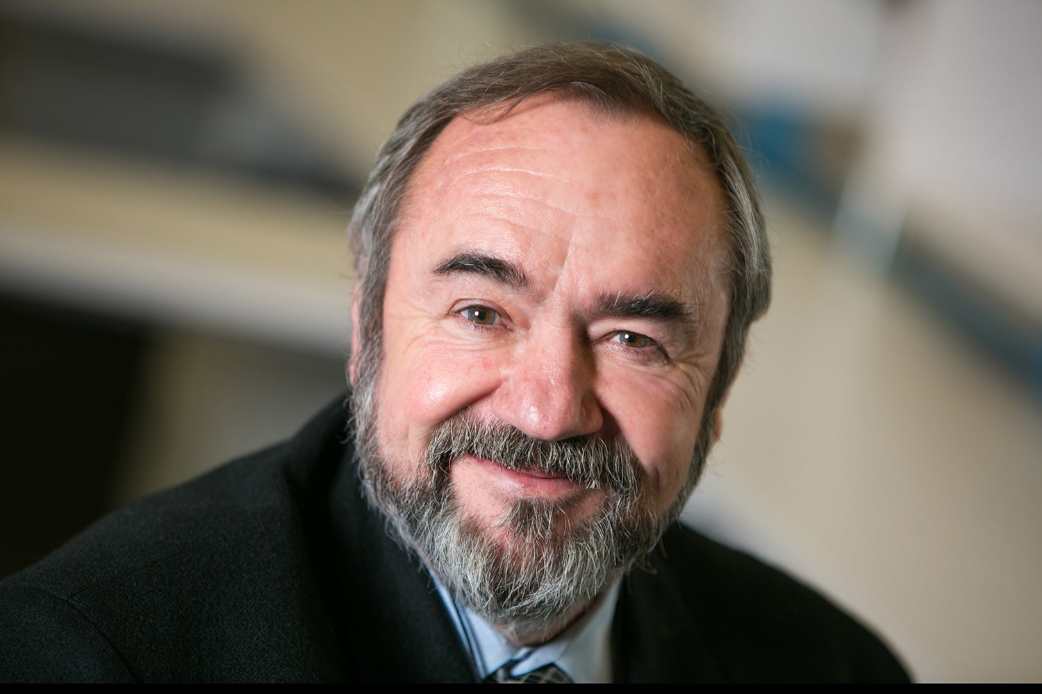 Larry D. Carr – Executive Leadership and Financial Expertise professional headshot, smiling in a business setting.