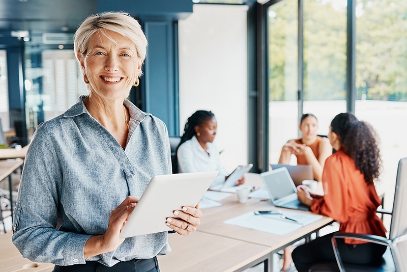 DEME LLC providing HR support and professional growth services, with a leader guiding a team meeting on employee development strategies.